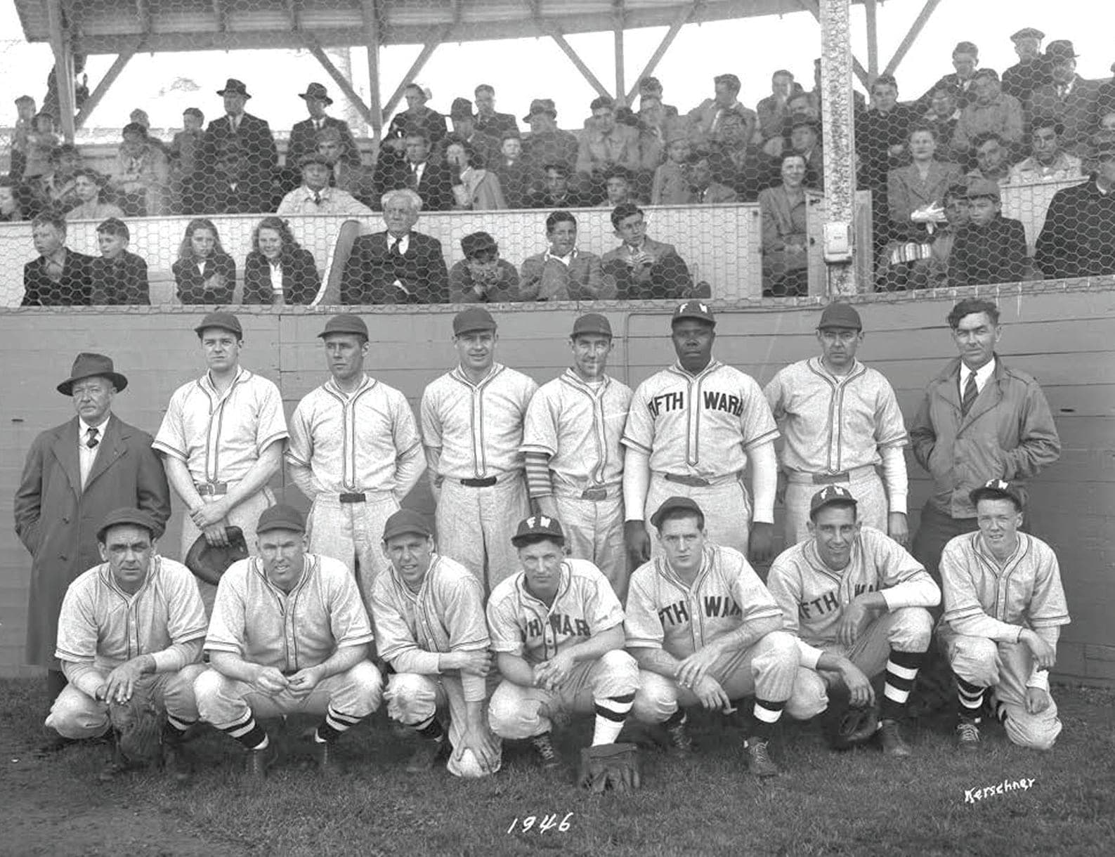 Black and white photograph of a Sunset League baseball game at Cardines Field in 1940, batter at the plate with the grandstand full behind